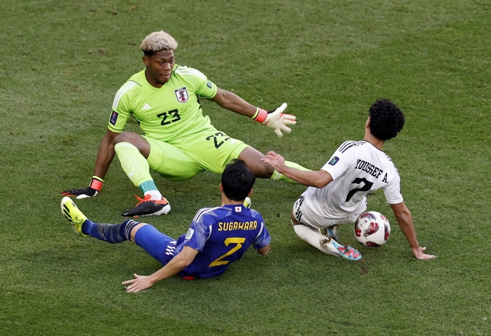 Thủ môn Suzuki trong trận đấu giữa Nhật Bản và Iraq ở vòng bảng Asian Cup 2023 zion-suzuki-trong-tran-dau-giua-nhat-ban-va-iraq-o-vong-bang
